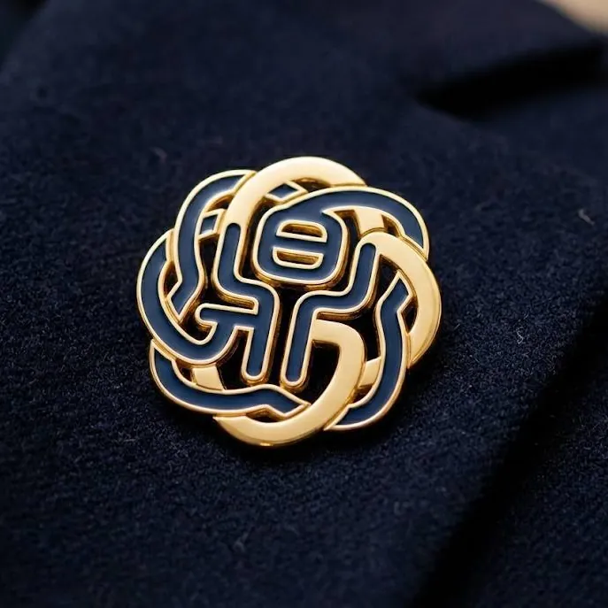 Aegis gold and navy lapel pin on a navy suit